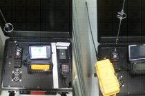 Portable GPS tracking system with radio frequency transmitter